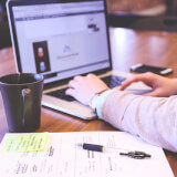 Student working at computer.